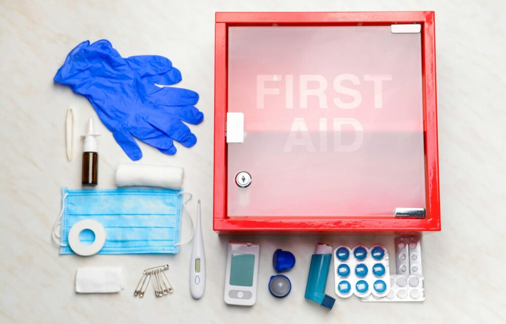 First aid kit concept, medicine equipment set in a suitcase box