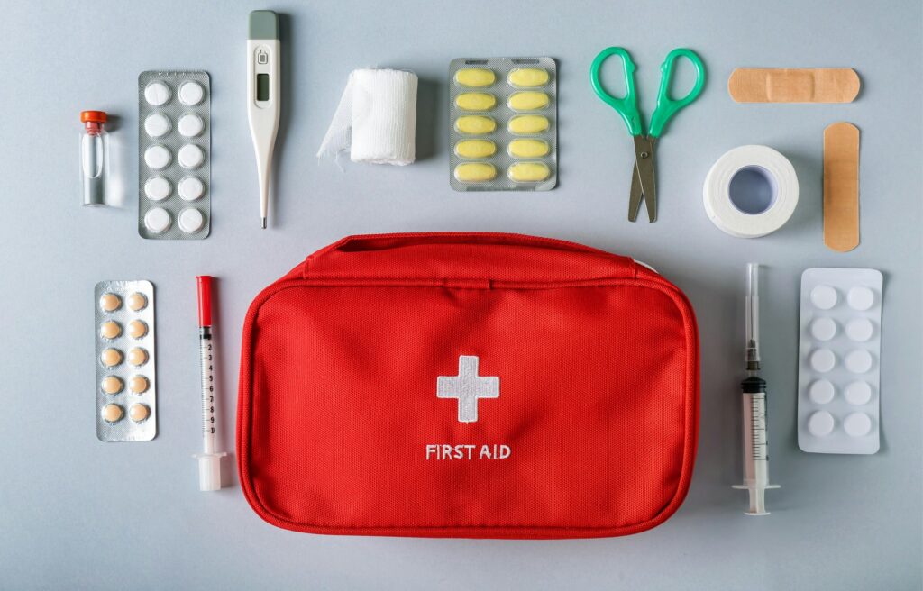 First aid kit concept, medicine equipment set in a suitcase box